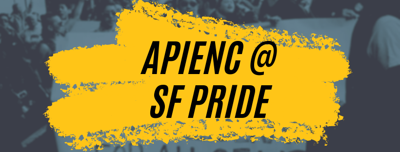 Image description: Black italicized text over orange brushstroke pattern that reads "APIENC @ SF PRIDE". In the background is an image, for the most part hidden, of TGNC API people marching and holding a banner that reads "NO PRIDE FOR SOME OF US WITHOUT LIBERATION FOR ALL OF US."