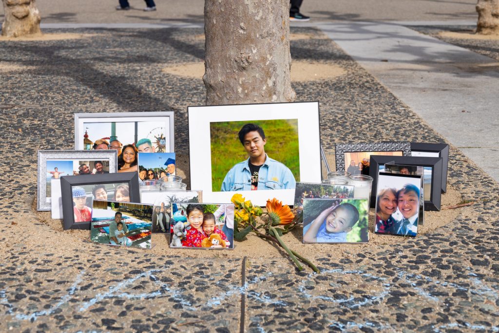 A photo of Jaxon smiling is surrounded by small photos of him with loved ones, and with flowers.